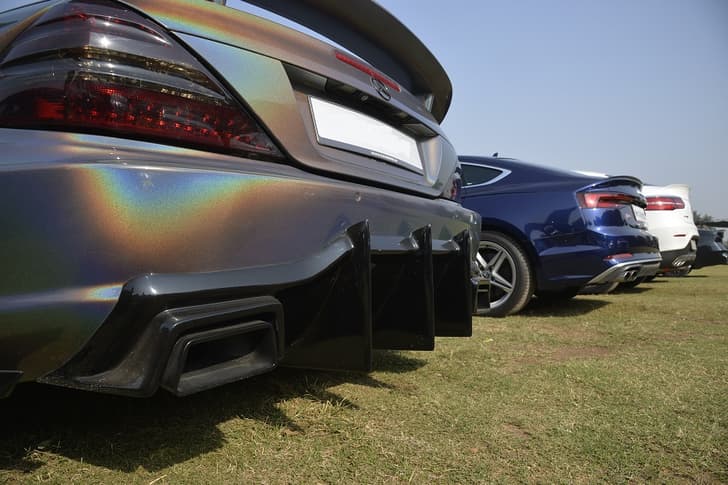Diffusing the situation. An Audi S5 is flanked by two Mercs.  